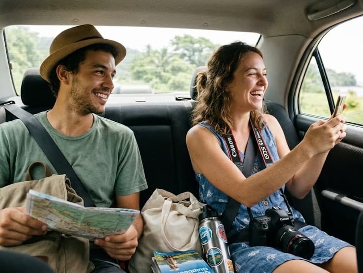 Travelers enjoying a comfortable GCRIDE journey